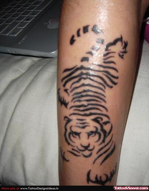 Black Ink Tribal Tiger Tattoo On Arm