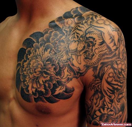 Grey Ink Dragon And Tiger Tattoo On Man Chest