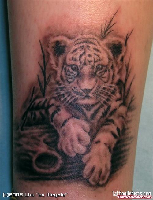 Grey Ink Baby Tiger Tattoo On Biceps