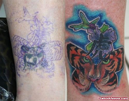 Color Flowers And Tiger Head Butterfly Tattoo