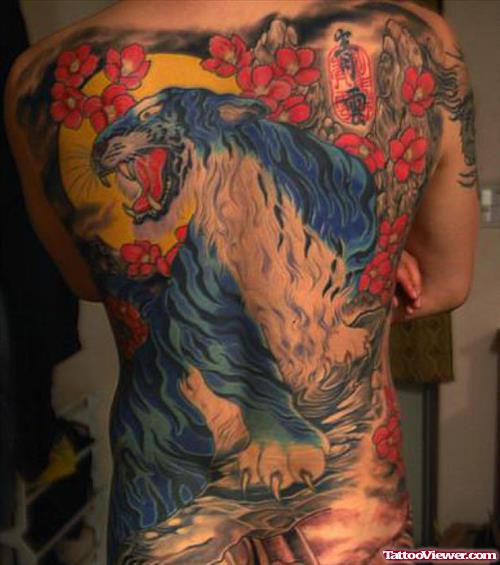 Beautiful Color Flowers And Tiger Tattoo On Back