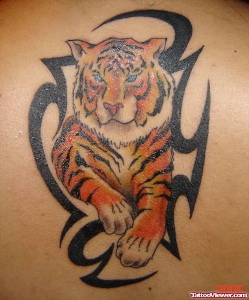 Black Tribal And Tiger Tattoo On Back