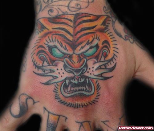 Beautiful Color Ink Tiger Head Tattoo On Right Hand