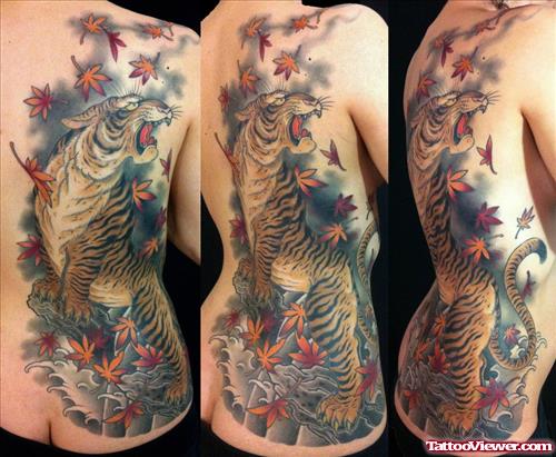 Maple Leafs And Tiger Tattoo On Girl Back