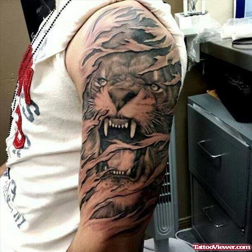 Grey Ink Tiger Head Tattoo On Left Half Sleeve