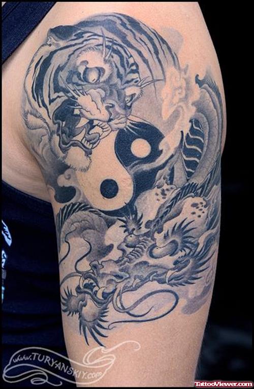 Grey Ink Tiger And Yin Yan Tattoo On Left Half Sleeve