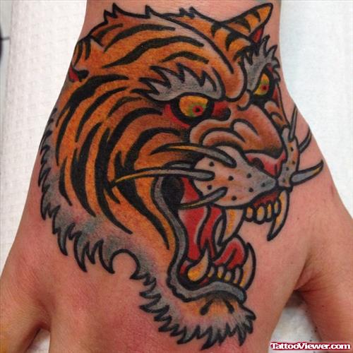 Awesome Color Ink Tiger Head Tattoo On Right Hand