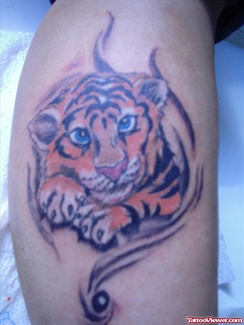 Colored Ink Baby Tiger Tattoo On Leg