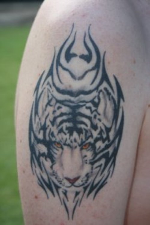 Grey Ink Tribal Tiger Tattoo On Bicep