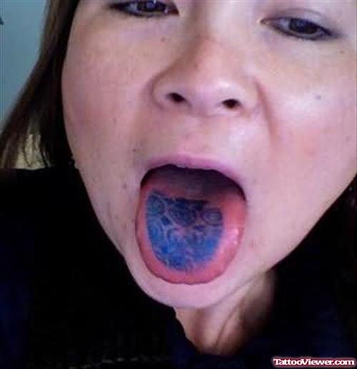 Blue Design Tattoo On Tongue
