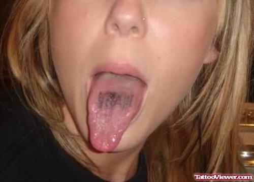 Faded Tongue Tattoo