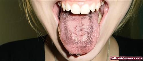 Face Tattoo On Tongue