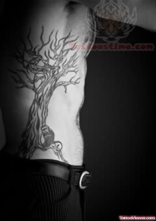 Black And White Tree Tattoo On Rib