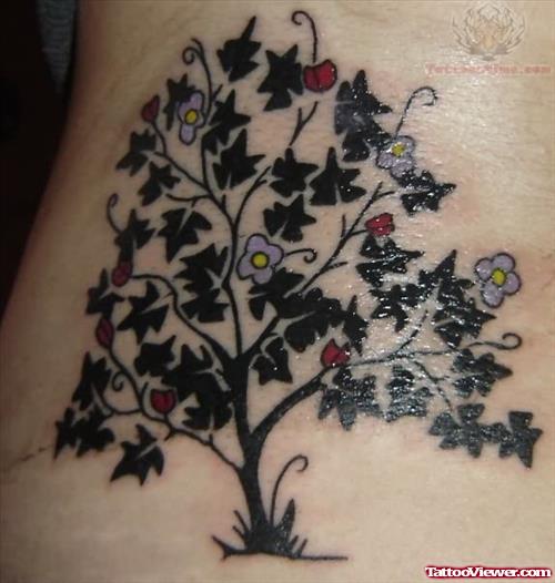 Tree Tattoo With Flowers