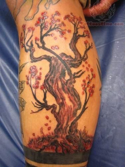 Color Ink Tree Tattoo on Biceps