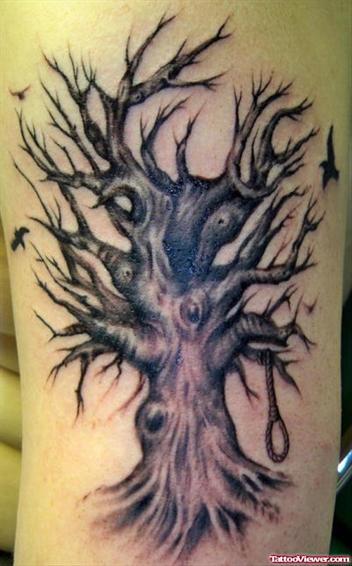 Black darkness tree tattoo with noose