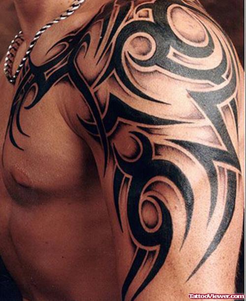 Man left Shoulder Tribal Tattoo
