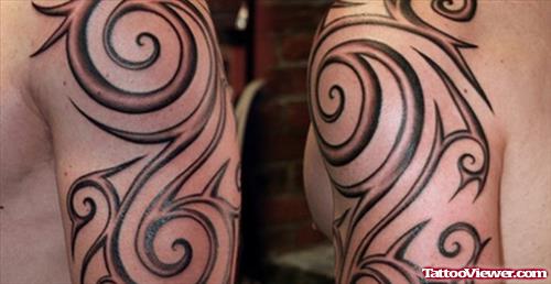 Grey Ink Tribal Tattoo On Half Sleeve