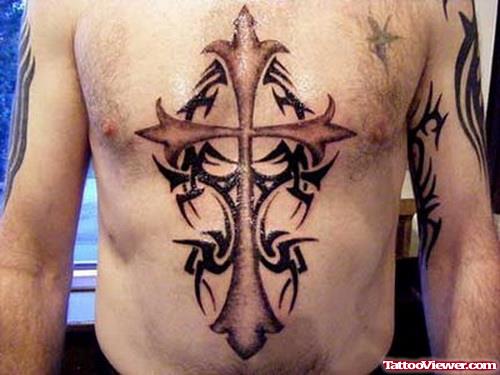 Cross And Tribal Tattoo On Man Chest