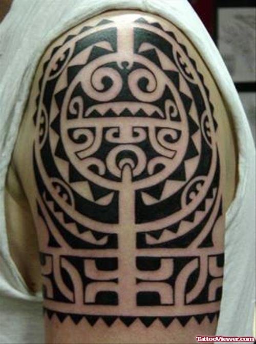 Black Ink Aztec Tribal Tattoo On Left shoulder