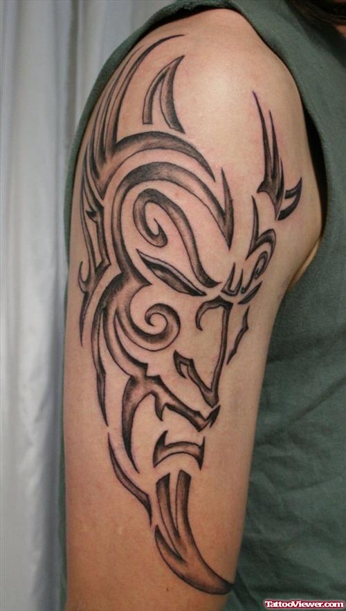 Grey Ink Tribal Tattoo On Right Half Sleeve