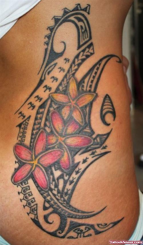 Flowers And Polynesian Tribal Tattoo