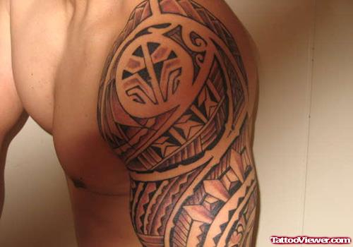 Filipino Tribal Tattoo On Man Left Half Sleeve