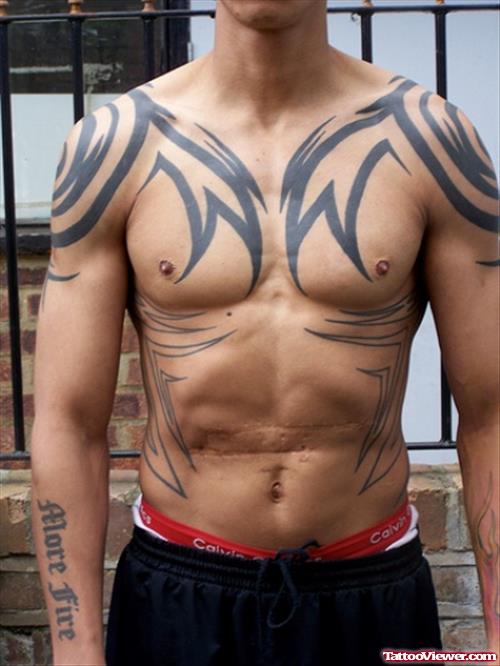 Amazing Black Ink Tribal Tattoo On Man Chest And Shoulders