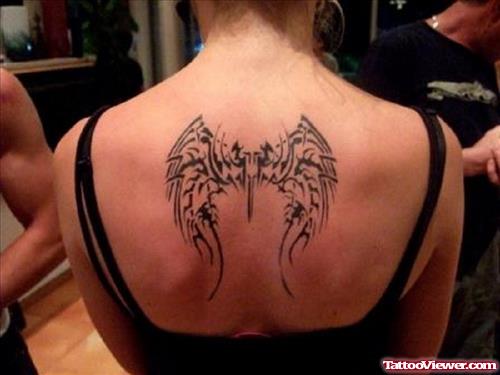 Tribal Wings Tattoos On Girl Upperback