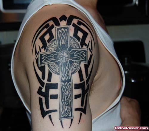 Tribal And Celtic Cross Tattoo On Right Shoulder