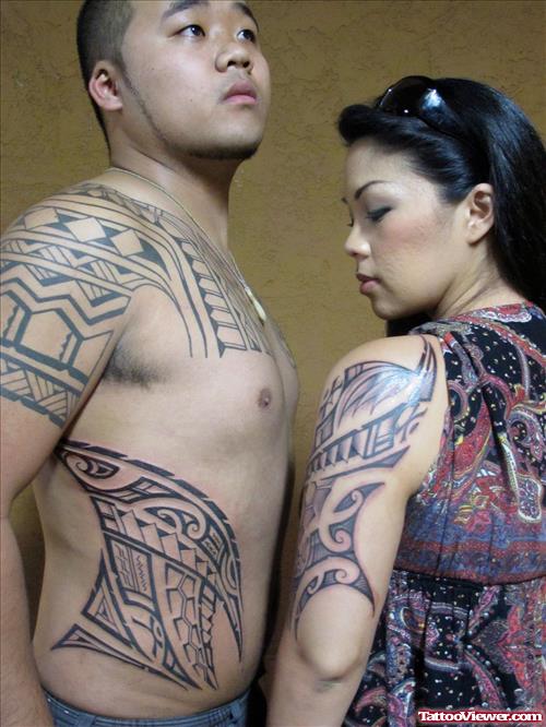 Tribal Tattoos On Side and Sleeve For Couple