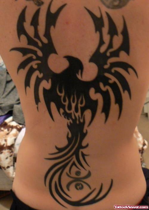 Tribal Phoenix Black Ink Tattoo On Back