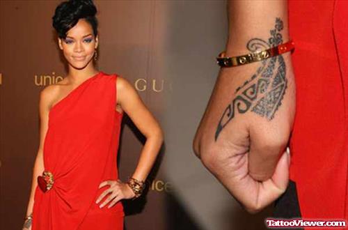 Rihanna With Tribal Tattoo On Right Hand
