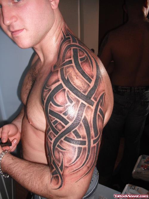 Left Biceps Tribal Tattoo