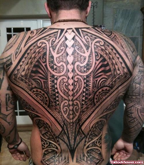 Black Ink Tribal Tattoo On Man Back