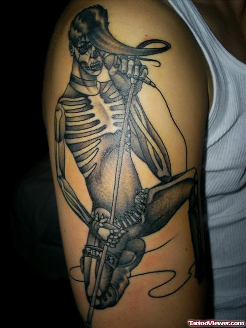 Tribal Skeleton With Mic Tattoo On Right Half Sleeve