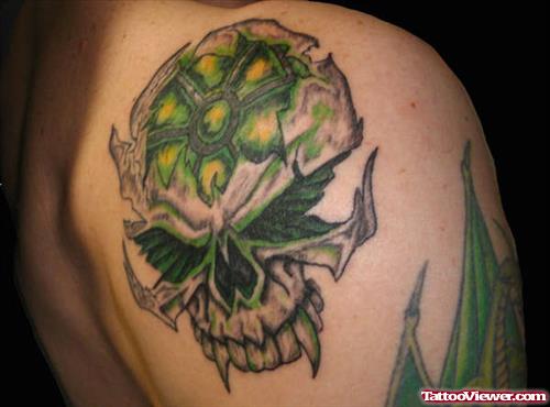 Green Ink Tribal Skull Tattoo On Right Back Shoulder