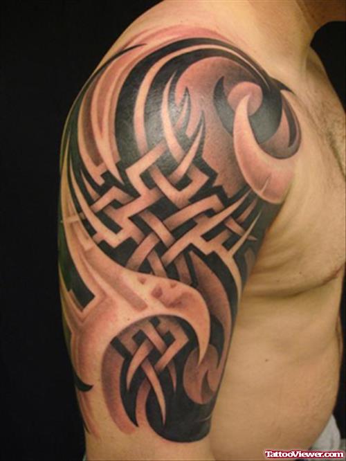 Tribal Tattoo On Man Right Half Sleeve