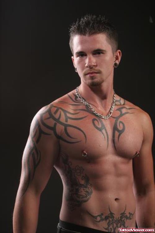Tribal Tattoo On Chest And Right Half Sleeve