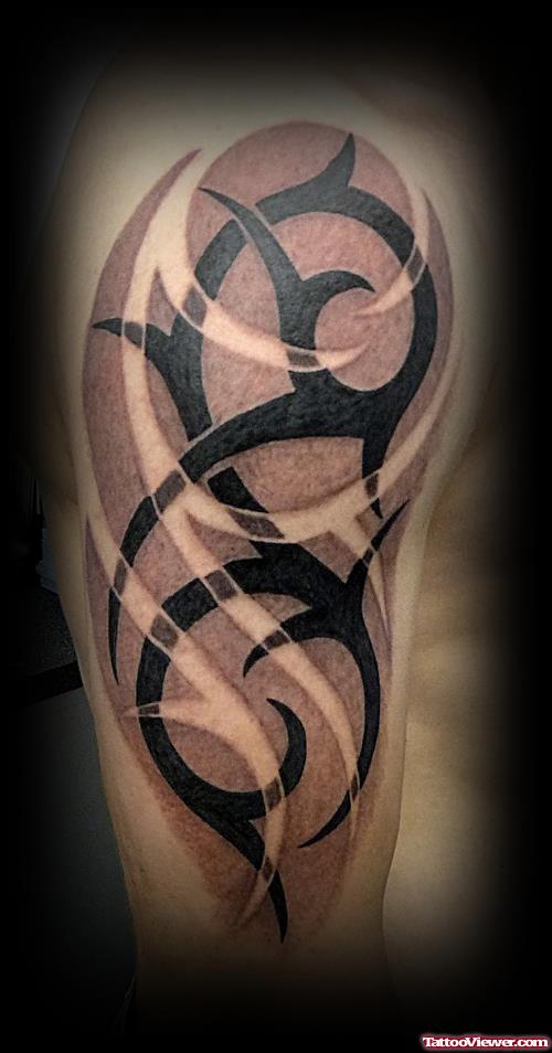 Half Sleeve Black Ink Tribal Tattoo For Men