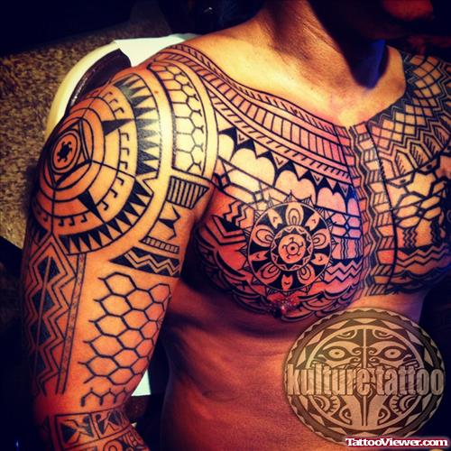 Filipino Tribal Tattoo On Man Chest And Right Half Sleeve