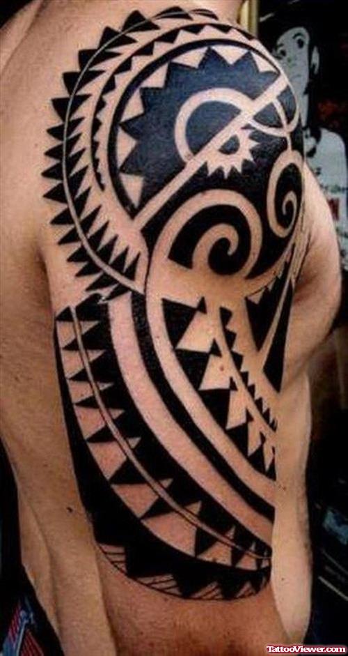 Tribal Black Ink Tattoo On Half Sleeve