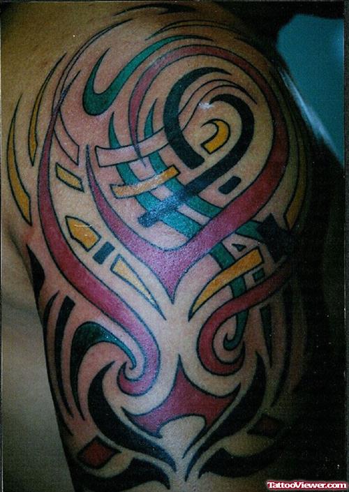 Colored Tribal Tattoo On Right Sleeve