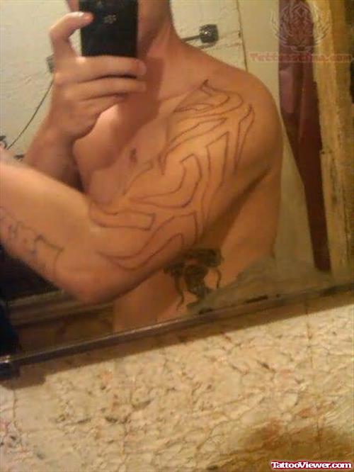 Tribal Outline Tattoo On Bicep