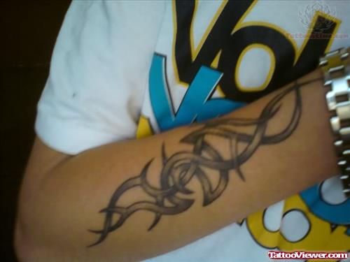 Tribal Tattoo On Arm For Men