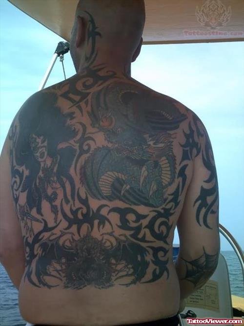 Tribal And Dragon Tattoo On Back