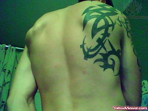Tribal Tattoo On Men Back Shoulder
