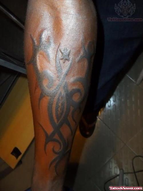 Tribal Tattoo On Left Arm