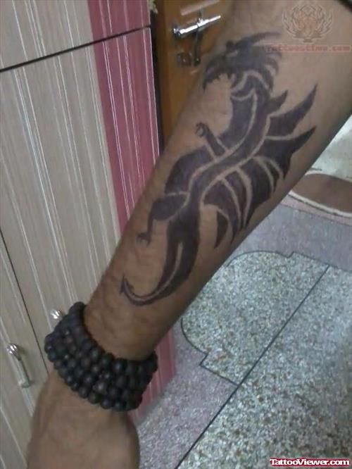 Tribal Dragon Tattoo On Right Arm