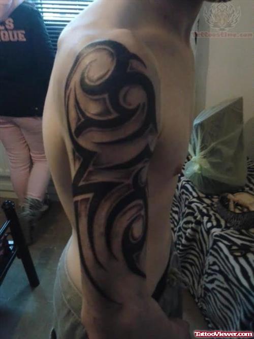 Half Sleeve Tribal Tattoo For Men
